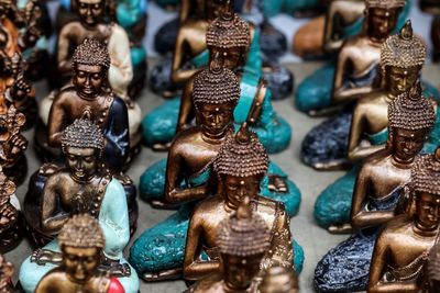 High angle view of buddha figurines for sale