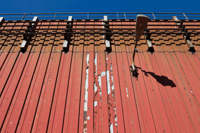 Low angle view street light on building