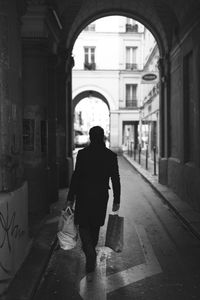 Full length of woman standing in building