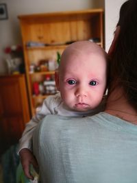 Portrait of cute baby at home