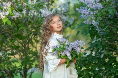 Beautiful young woman looking at camera