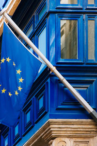 Low angle view of european union flag on building
