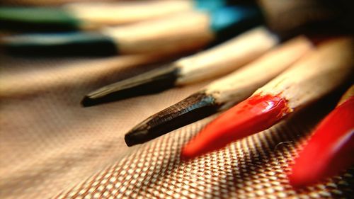 Close-up of colored pencils on table