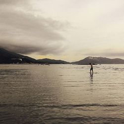 Scenic view of sea against cloudy sky