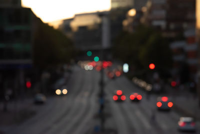 Defocused image of traffic on road at night