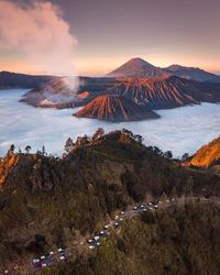 Scenic view of mountain against cloudy sky