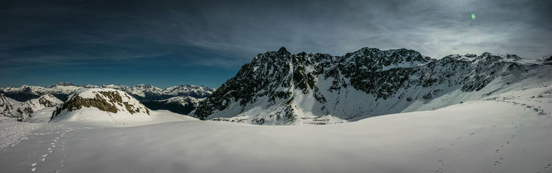 Snow covered mountain against sky