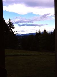 Scenic view of field against sky during sunset