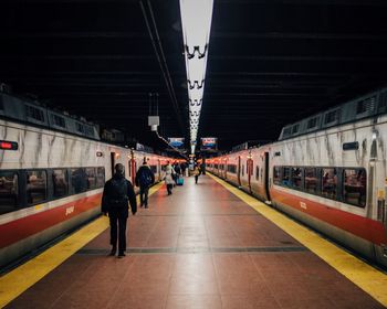 People at railroad station platform