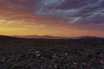 Scenic view of landscape against sky during sunset