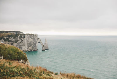 Scenic view of sea and cliff