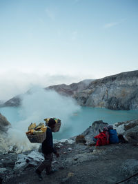 Scenic view of volcanic mountain against sky