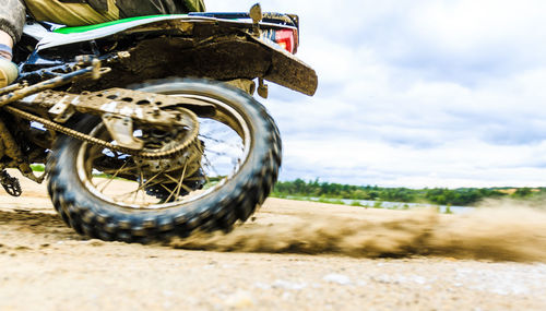 Close-up of bicycle on road