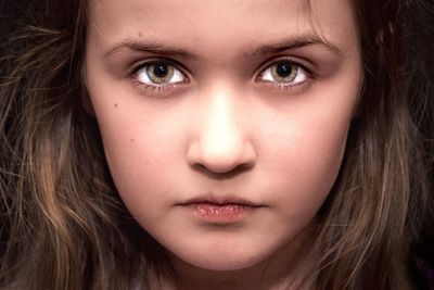 Close-up portrait of serious girl