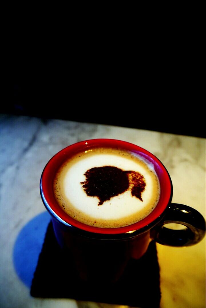 CLOSE-UP OF COFFEE CUP WITH COFFEE CUP