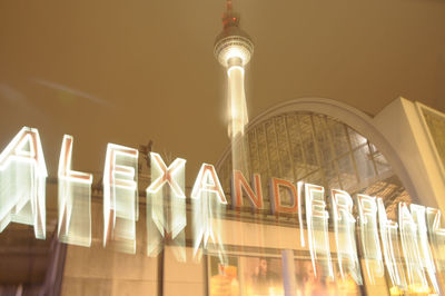 Low angle view of illuminated lamp