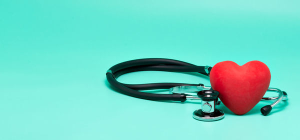 Close-up of heart shape against blue background