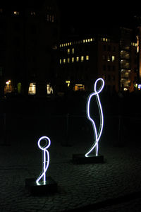 Light painting on wall in city at night