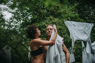 Young couple standing in park