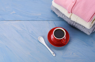 High angle view of coffee cup on table