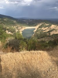 Scenic view of river against sky