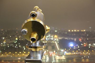 View of illuminated cityscape against sky at night