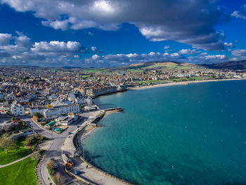 High angle view of town by sea