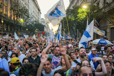 Group of people on street in city