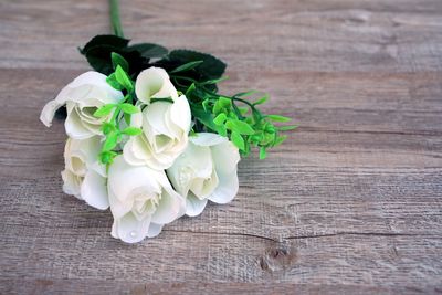 High angle view of white rose on table