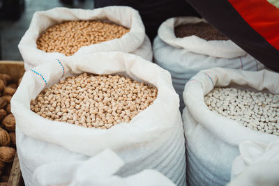 Close-up of food in sacks at market stall