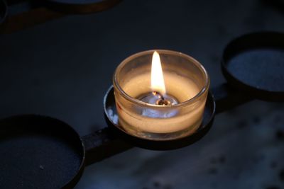 Close-up of burning candle