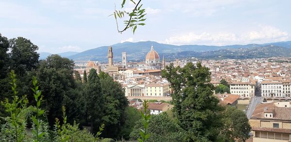 Panoramic view of town by buildings in city