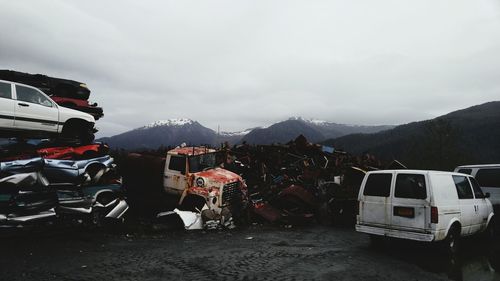 Mountain range against cloudy sky