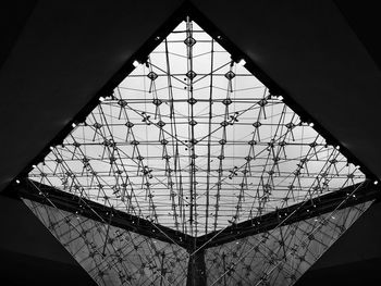 Low angle view of louvre pyramid