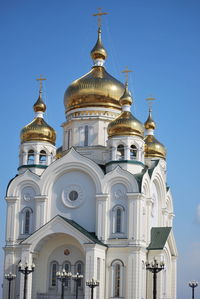 Low angle view of building against blue sky