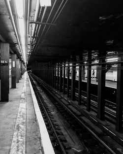 Railroad station platform at night