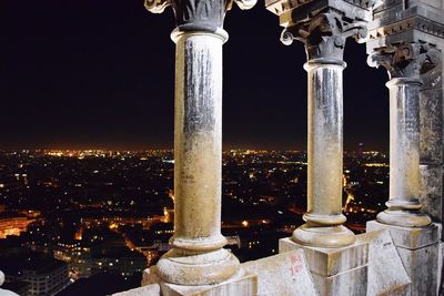 Illuminated buildings in city at night