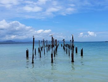 Scenic view of sea against blue sky