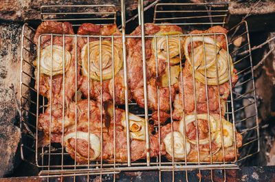 Close-up of meat on barbecue grill