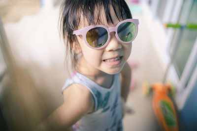 Portrait of girl wearing sunglasses