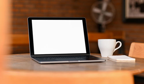 Coffee cup on table