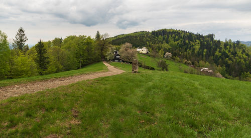 Scenic view of land against sky