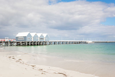 Pier over sea against sky