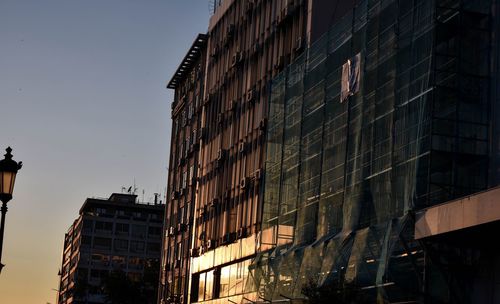 Low angle view of modern building against sky