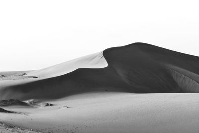 Scenic view of desert against clear sky