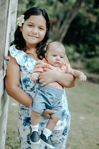 Portrait of smiling mother