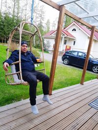 Portrait of man sitting in park