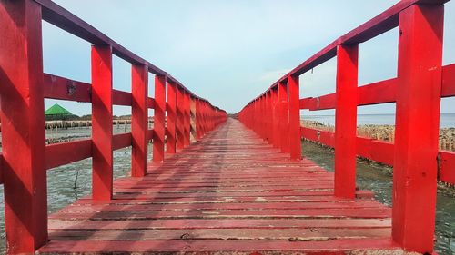 View of red bridge against sky