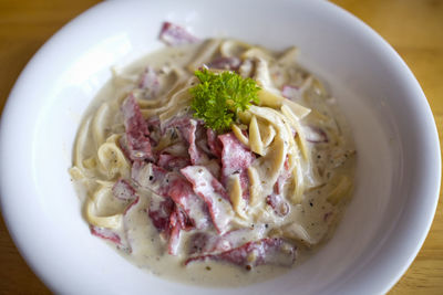 High angle view of pasta in plate on table