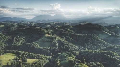 Aerial view of landscape and mountains against sky